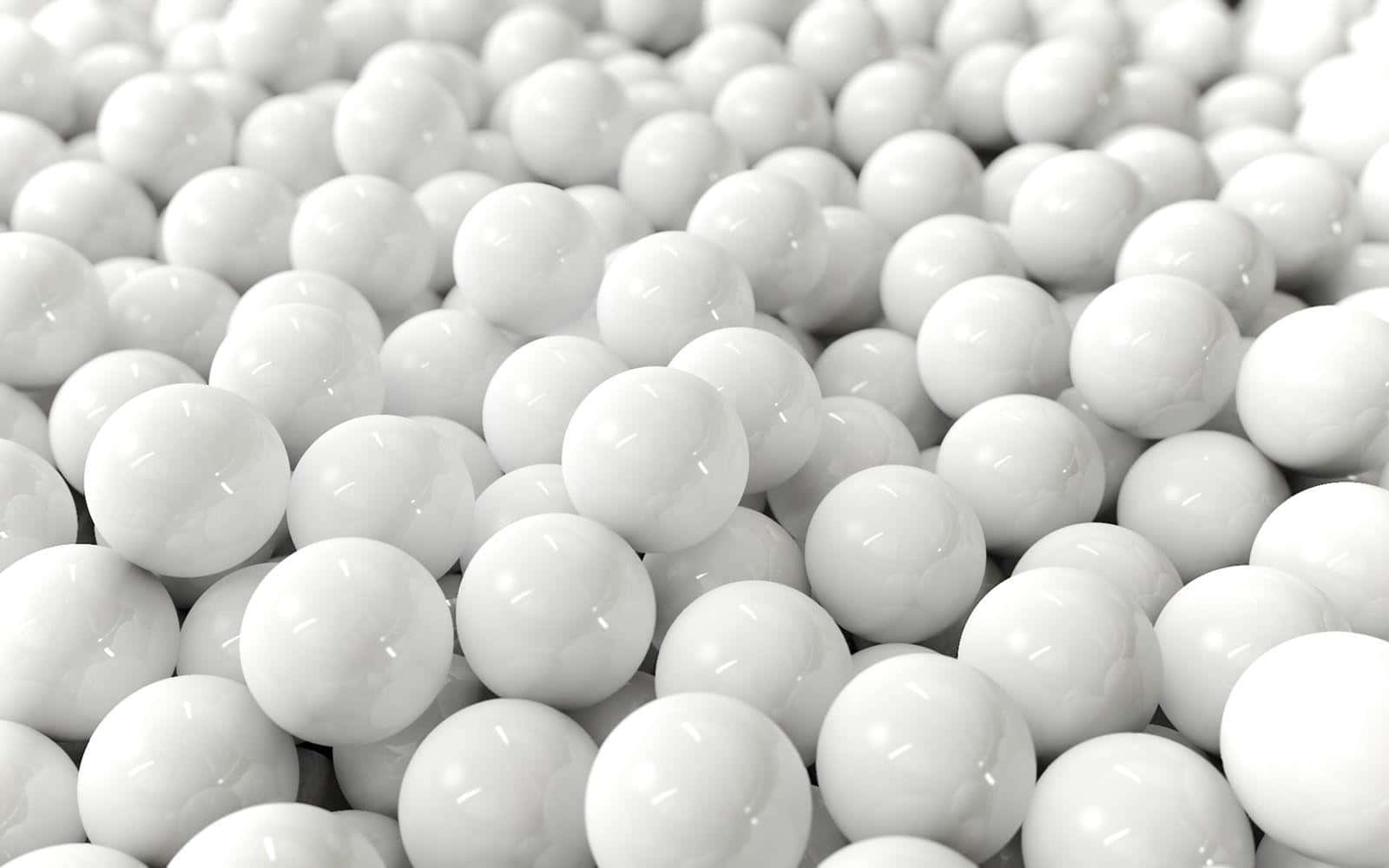 Egg 桌布 壁紙 — 密集的光澤白色球體場域，以淺景深反射柔和光線。