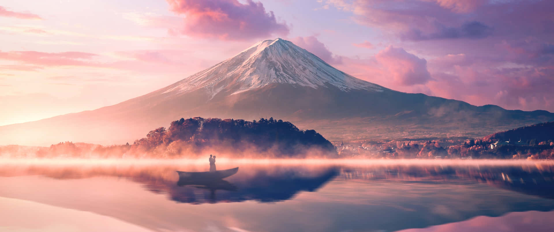 霧湖中乘船的人與富士山日出