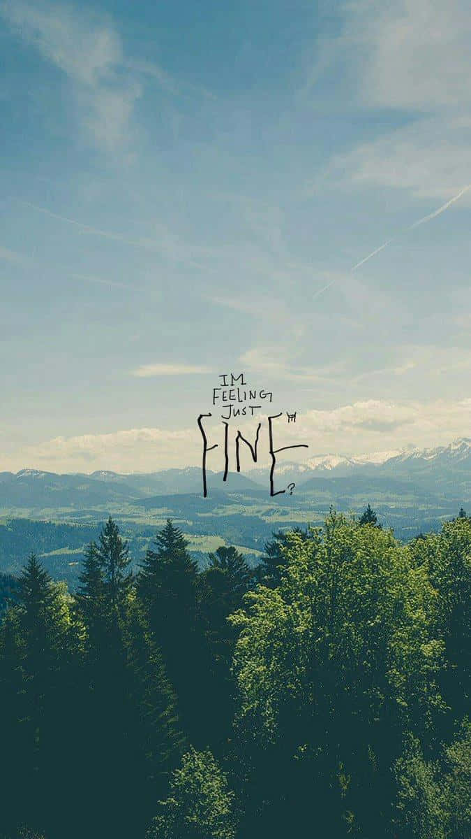 Bts Fanart 桌布 壁紙 — 寧靜的山景，有茂密的綠樹和遠處白雪覆蓋的山峰，在清澈的藍天下，帶有手寫文字疊加。