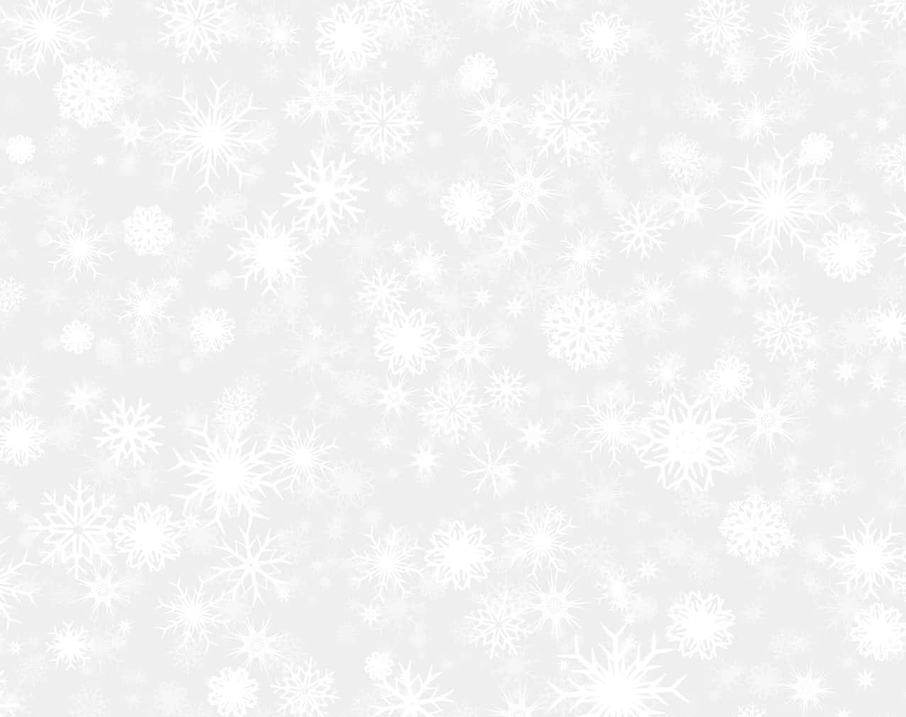 寧靜的雪景 壁紙 — 柔軟嘅灰色背景，上面佈滿咗各種精緻複雜設計同大小嘅白色雪花。