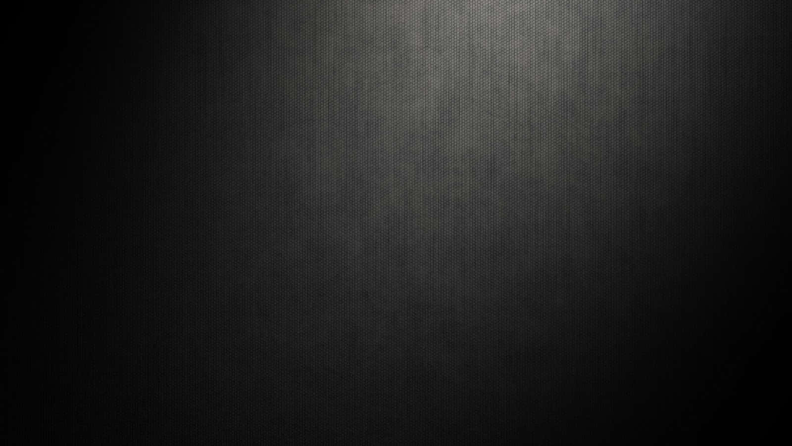 專業攝影師捕捉值得珍藏的瞬間 壁紙 — 深色紋理表面，帶有從中心向邊緣漸變的微妙聚光燈效果。