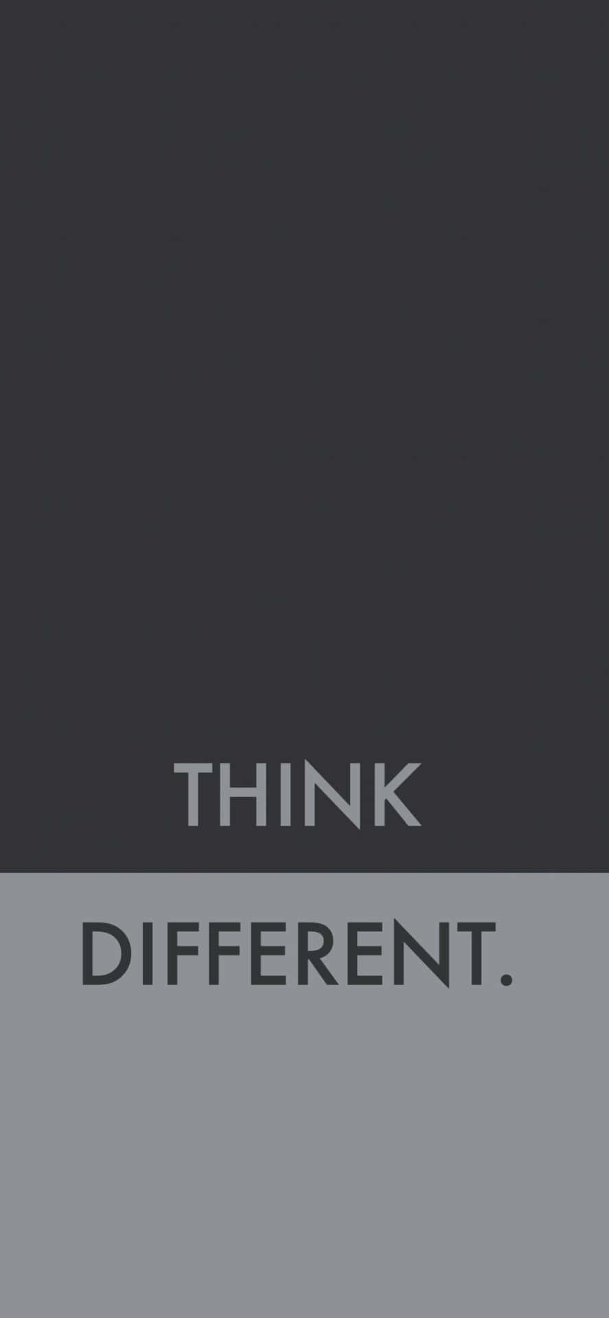 在雙色調灰色背景上的粗體文字THINK DIFFERENT。