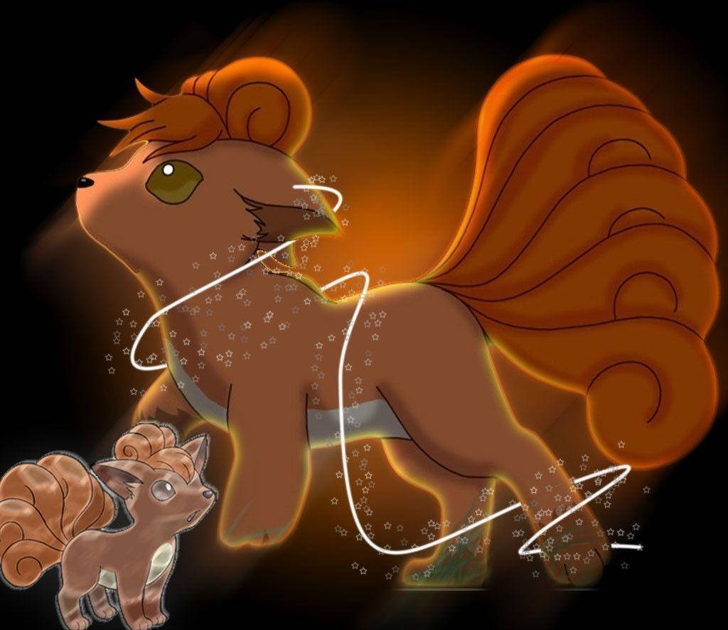 小 Vulpix 與大 Vulpix 壁紙 — 一個發光的橙色狐狸狀生物，有著一條大而蓬鬆的尾巴，站在一個較小的版本旁邊，兩者都被閃爍的星星包圍，背景是黑暗的。