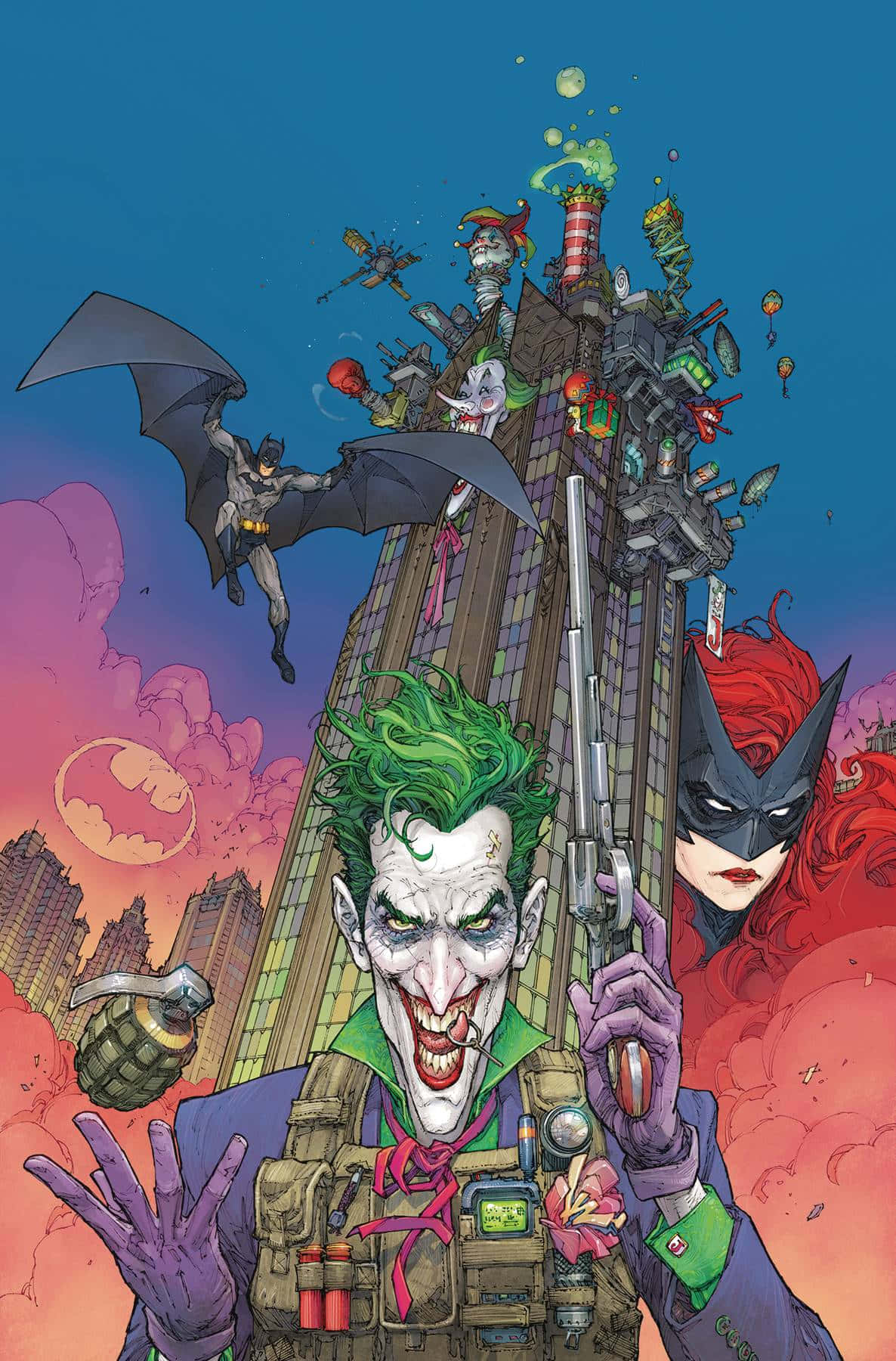 Batman Comics 桌布 壁紙 — 小丑在摩天大樓頂上狂笑，蝙蝠俠和蝙蝠女俠在熾熱的日落天空下與他對峙。