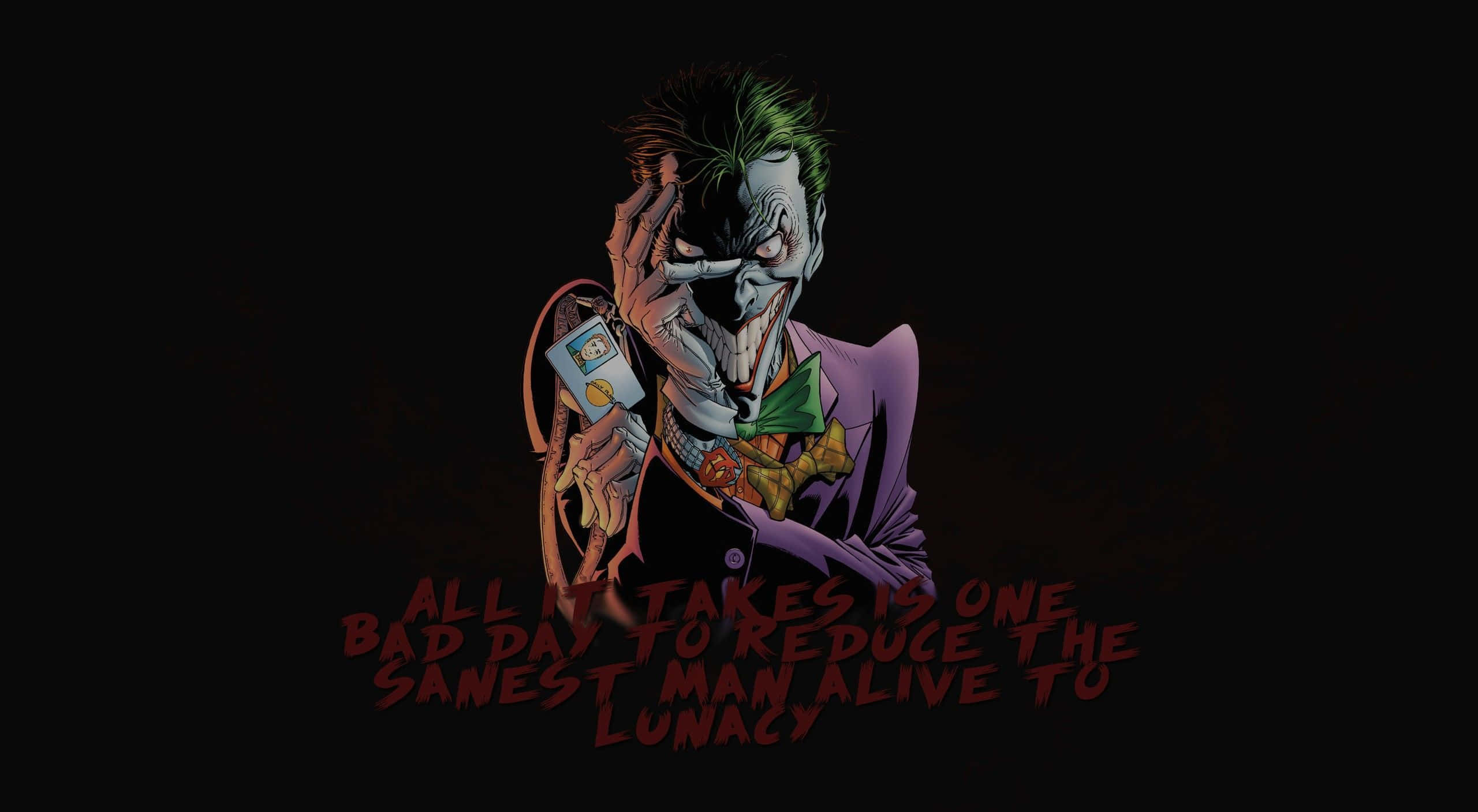 Joker Quotes 桌布 壁紙 — 小丑在黑色背景前狂笑，手持一張撲克牌，下方有紅色字體的台詞。