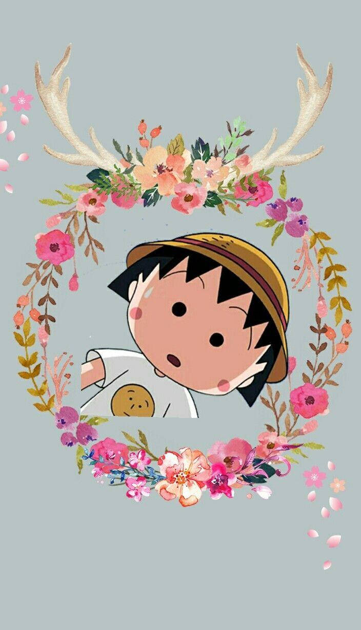 動漫角色長著鹿角，被色彩繽紛的花環框住。