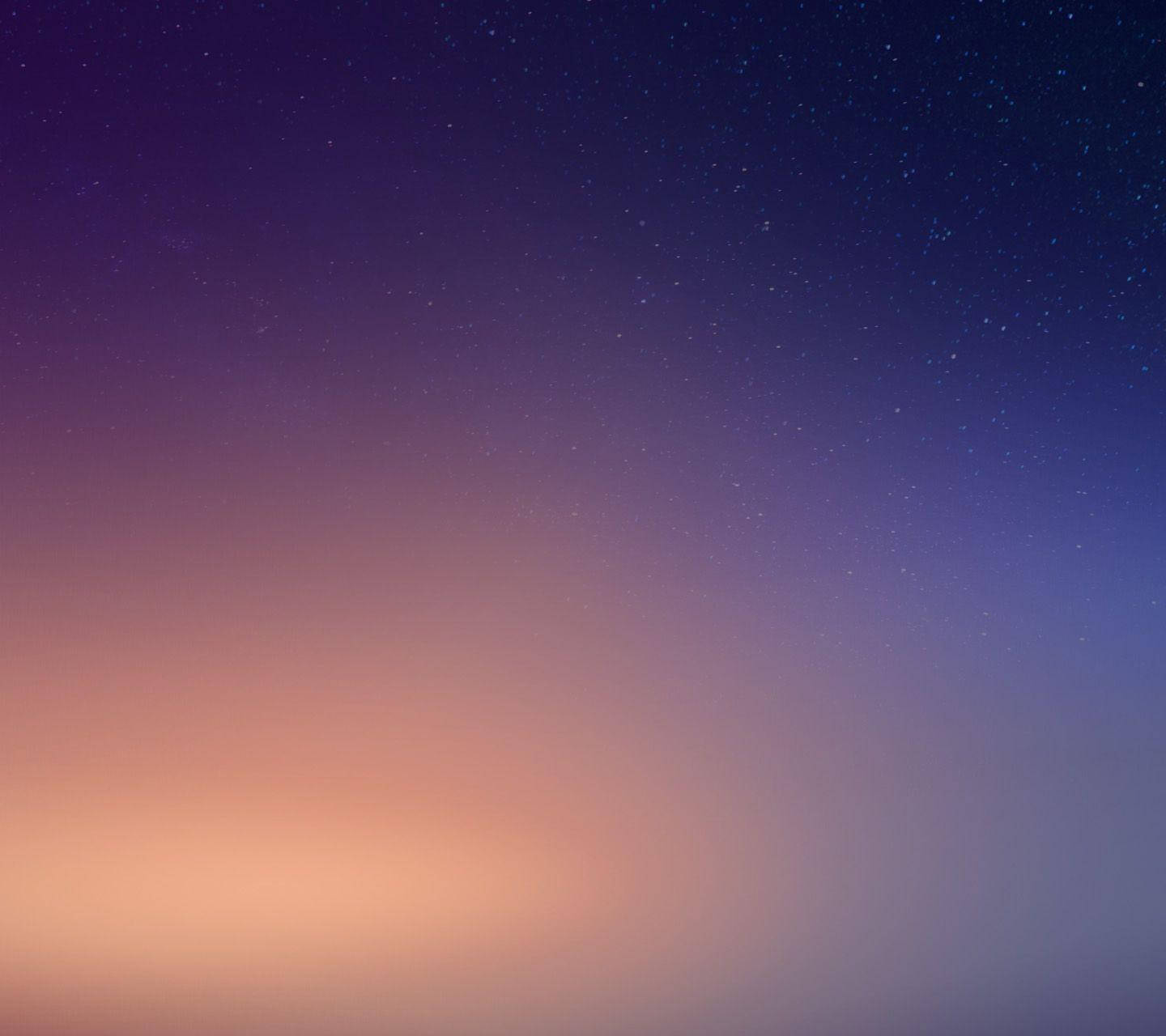 小米繁星夜空 壁紙 — 寧靜的黃昏天空從溫暖的蜜桃色過渡到深靛藍色，點綴著無數閃爍的星星。