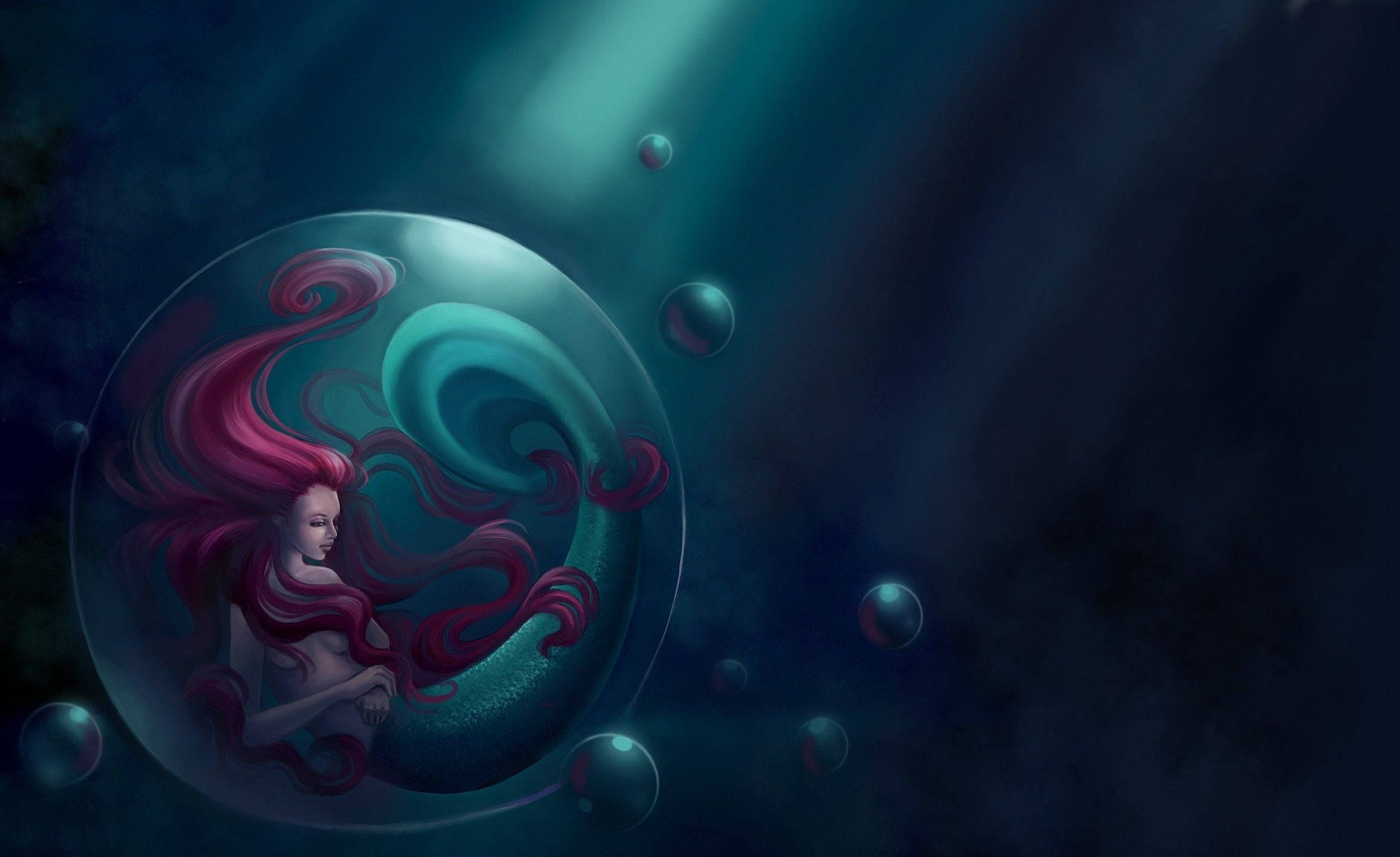 小美人魚的海之女王 壁紙 — 一位平靜的美人魚，擁有飄逸的紅髮，漂浮在一個發光的泡泡內，周圍環繞著較小的泡泡，背景是深海洋藍色。