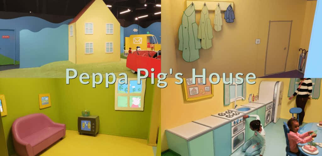孩子們在Peppa Pig主題室內遊戲區玩耍，設有卡通屋牆和玩具廚房。