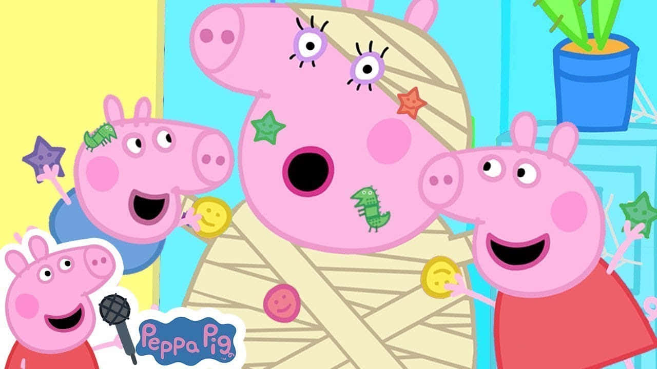 Peppa Pig 和朋友們打扮成木乃伊，貼上星星貼紙。