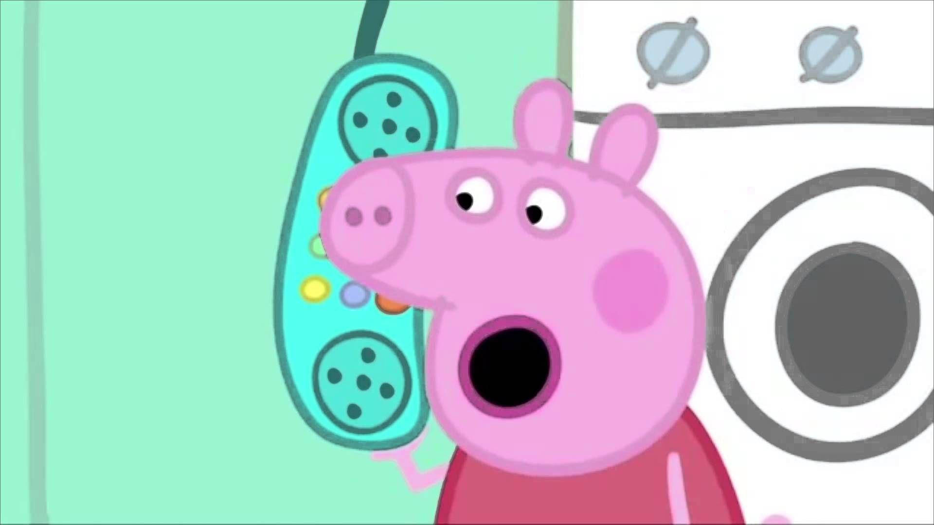 佩佩豬拎住一個色彩繽紛嘅電話，表情驚訝。