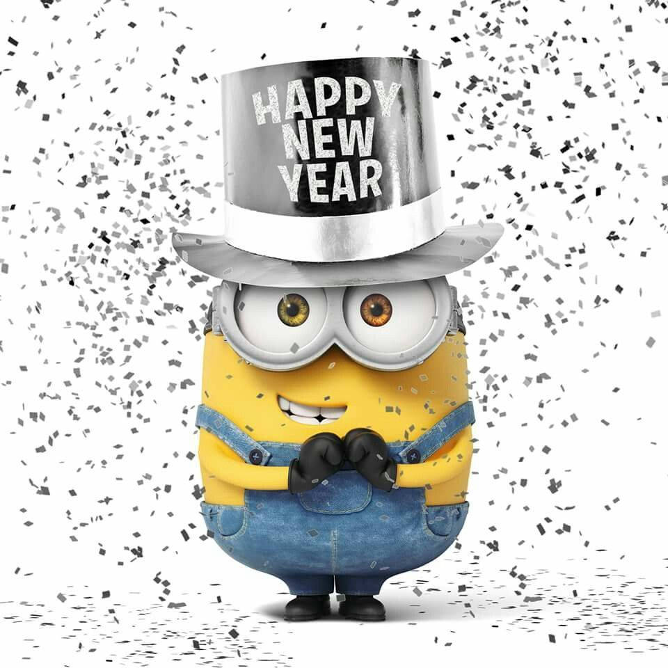黃色Minion身穿藍色工裝褲和銀色高帽，在飄落的紙屑中慶祝新年。