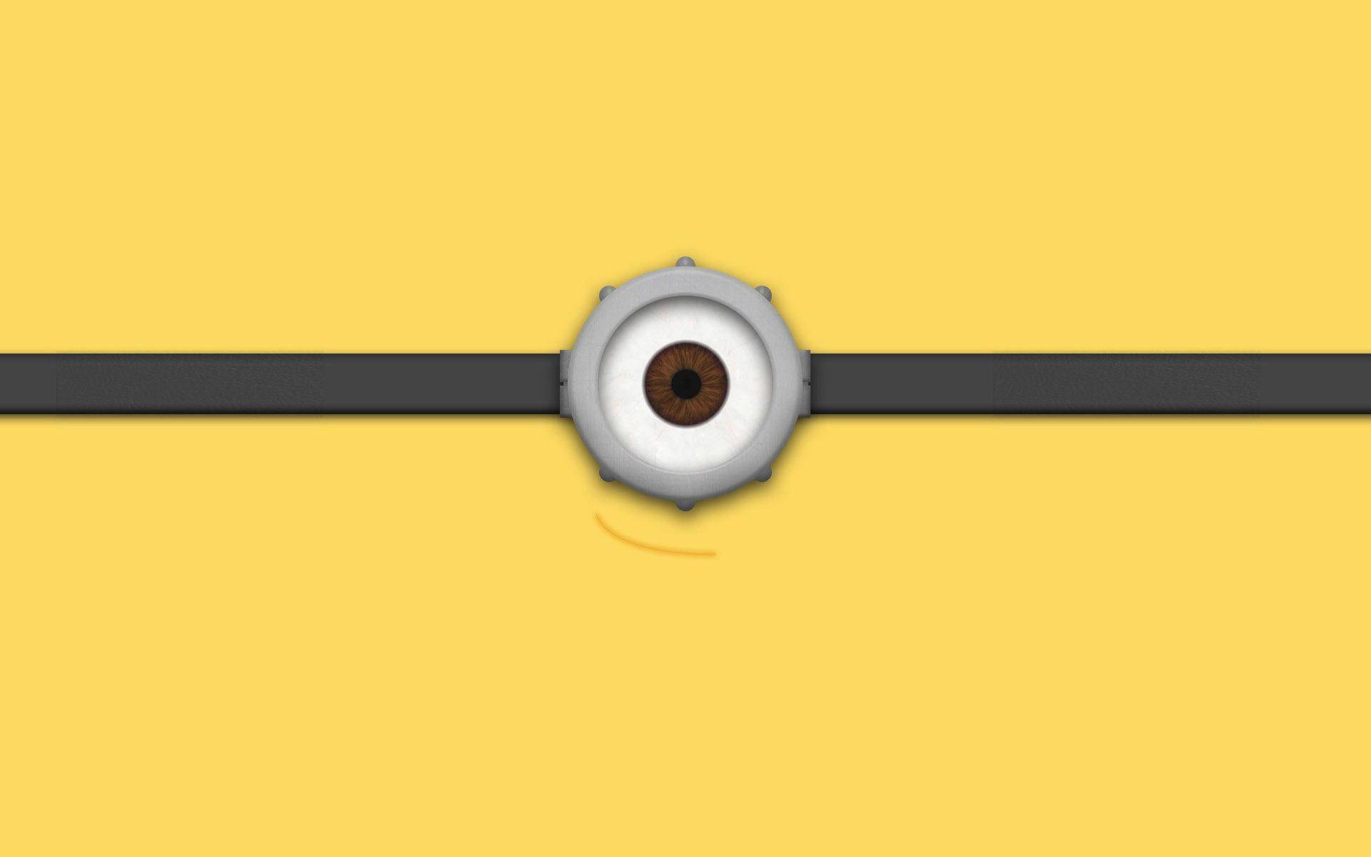卡通 minion 眼睛，帶黑色帶子，黃色背景