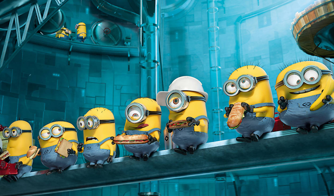 Minions在藍色工業實驗室的傳送帶上吃三明治。