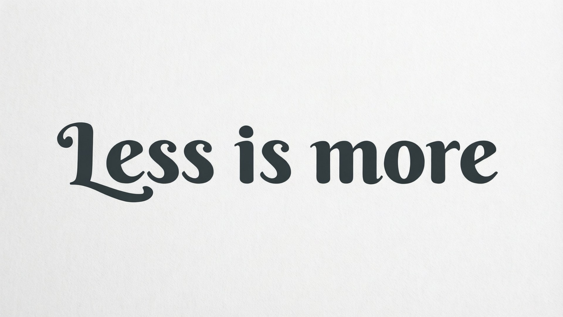 「less is more」以黑色手寫體顯示喺有紋理嘅白色背景上