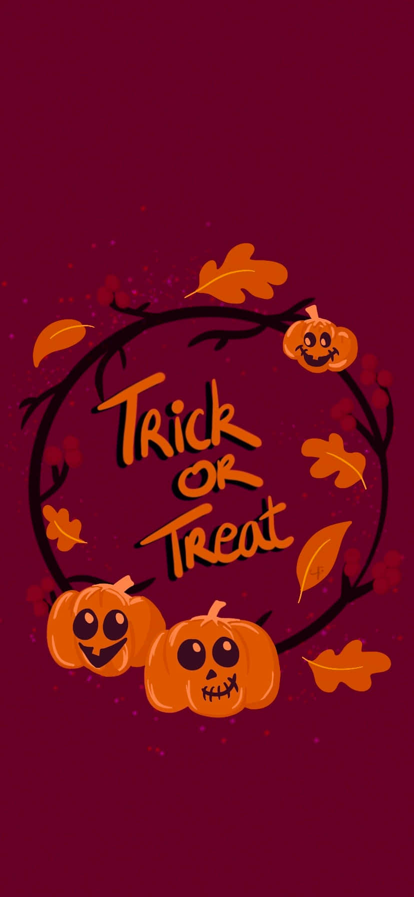 萬聖節南瓜和樹葉組成花環，帶有「Trick or Treat」文字。