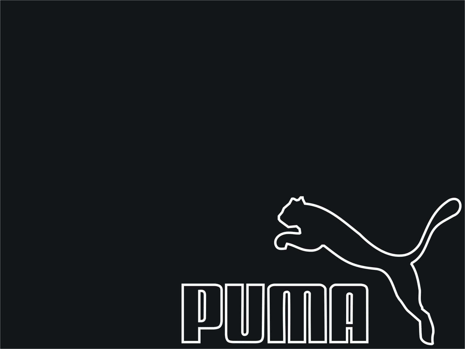 展現Puma的精神 壁紙 — 純黑色背景上，一個跳躍美洲獅的極簡白色輪廓和「PUMA」字樣。