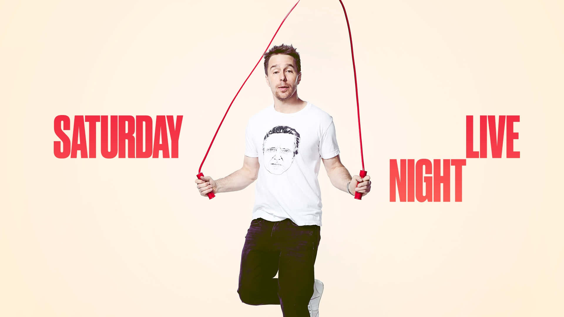 男子跳繩，帶有紅色「Saturday Night Live」文字。