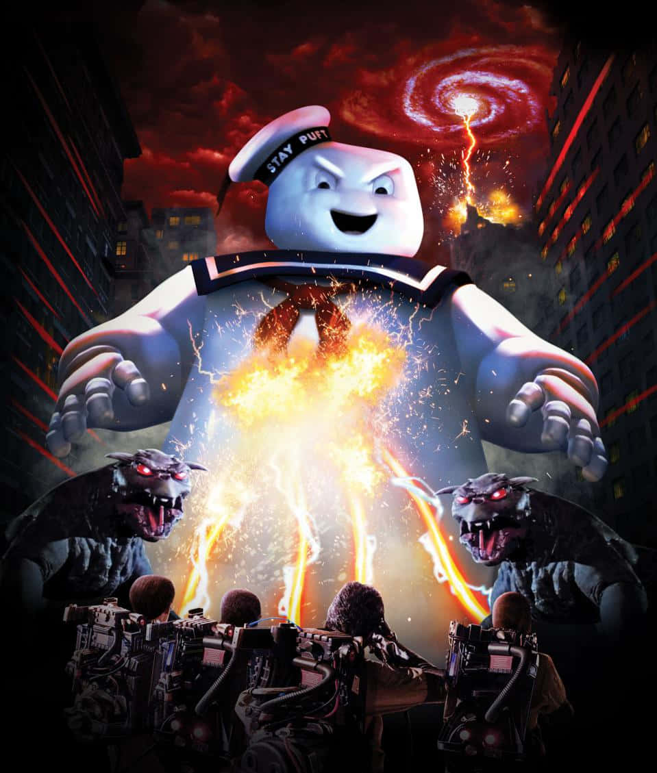 Ghostbusters 桌布 壁紙 — 巨型 Stay Puft 棉花糖人聳立於城市之上，捉鬼敢死隊在火紅的天空下將質子背包對準他。