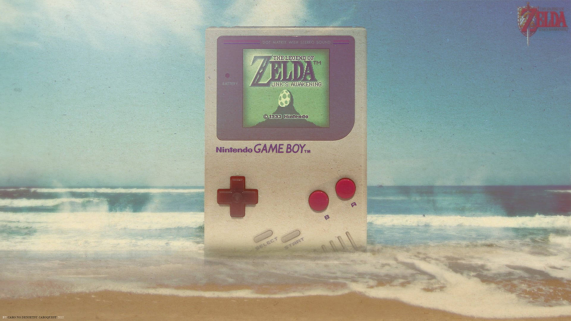 巨型任天堂Game Boy在海灘 壁紙 — 一部復古任天堂Game Boy在明亮的天空下直立於沙灘的淺海水之中。