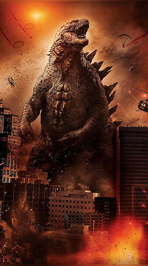 Godzilla Comic 桌布 壁紙 — 巨型哥斯拉在燃燒的城市景觀中咆哮，直升機和降落傘在熾熱的橙色天空下與這隻龐然大物戰鬥。