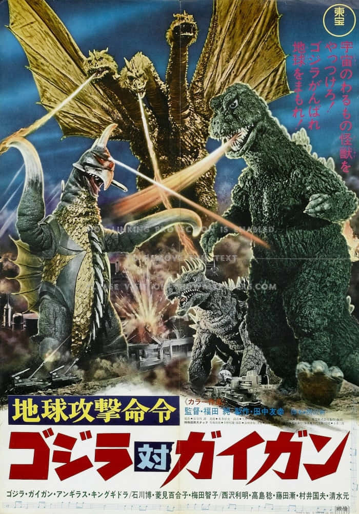 Gigan 桌布 壁紙 — 巨型怪獸哥斯拉與王者基多拉在燃燒的城市景觀上空交戰，經典日本怪獸電影海報。