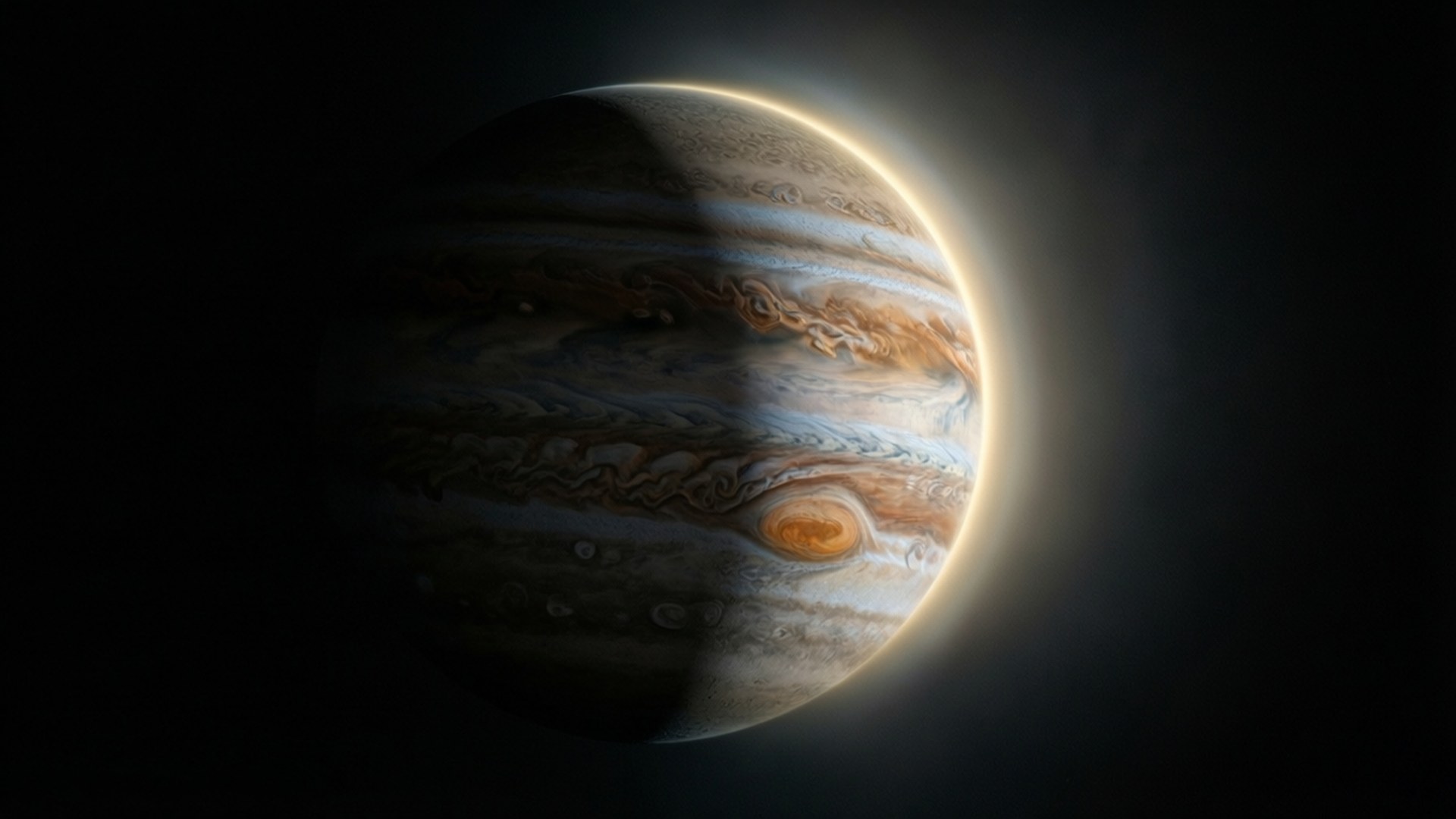 木星行星，帶有漩渦狀雲層和太空中明亮的陽光照射的月牙形。