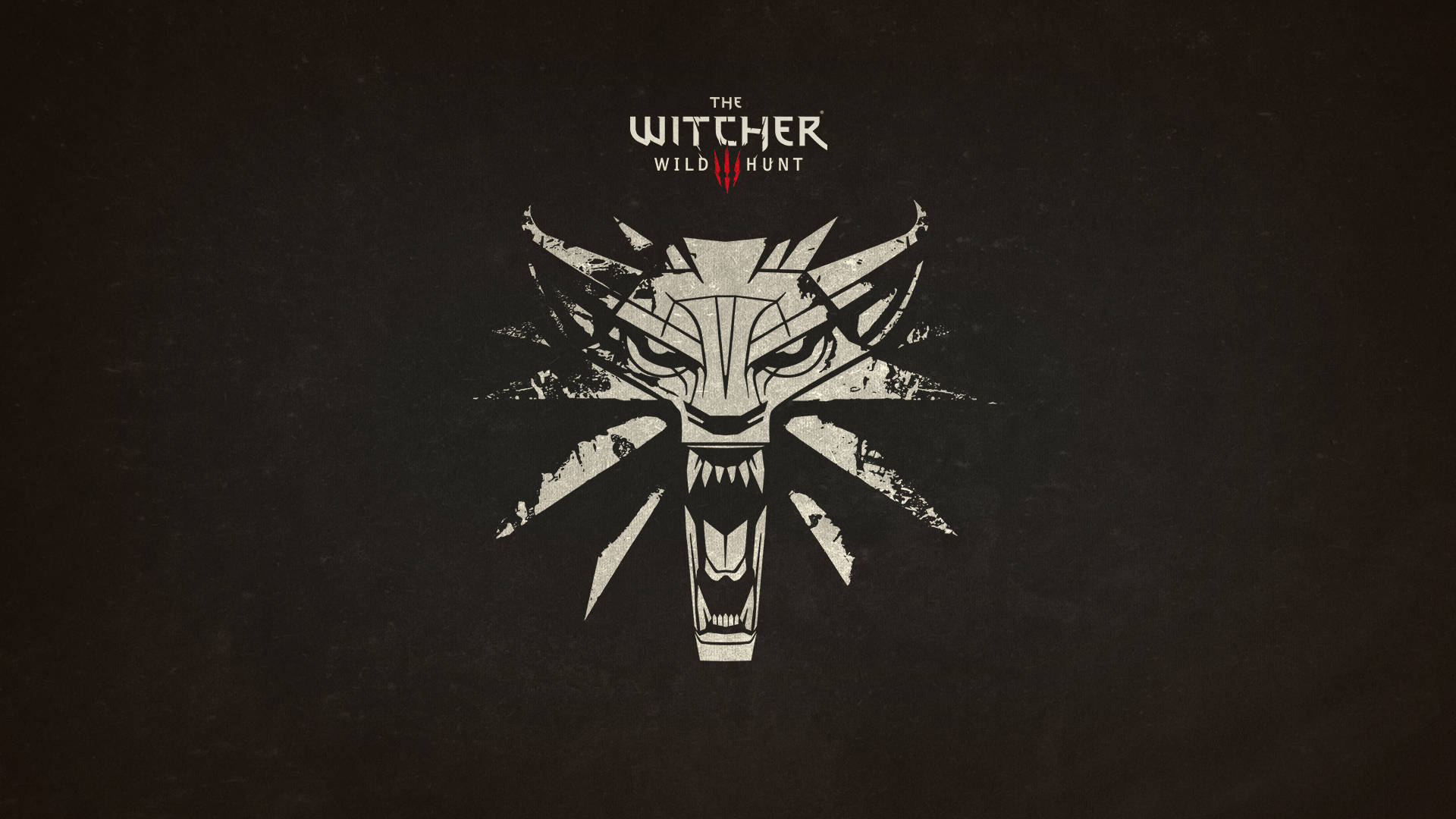 The Witcher 3 Wild Hunt 標誌，特色是風格化狼頭，帶有鋒利牙齒和尖刺。