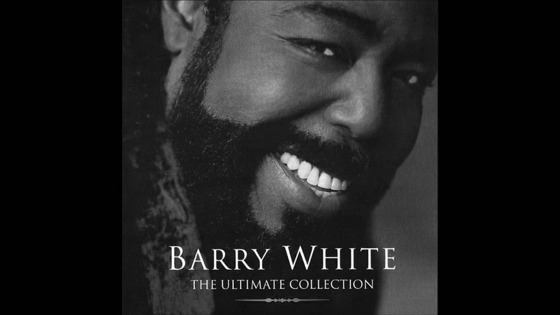 巴里·懷特在專輯封面上微笑，文字為The Ultimate Collection