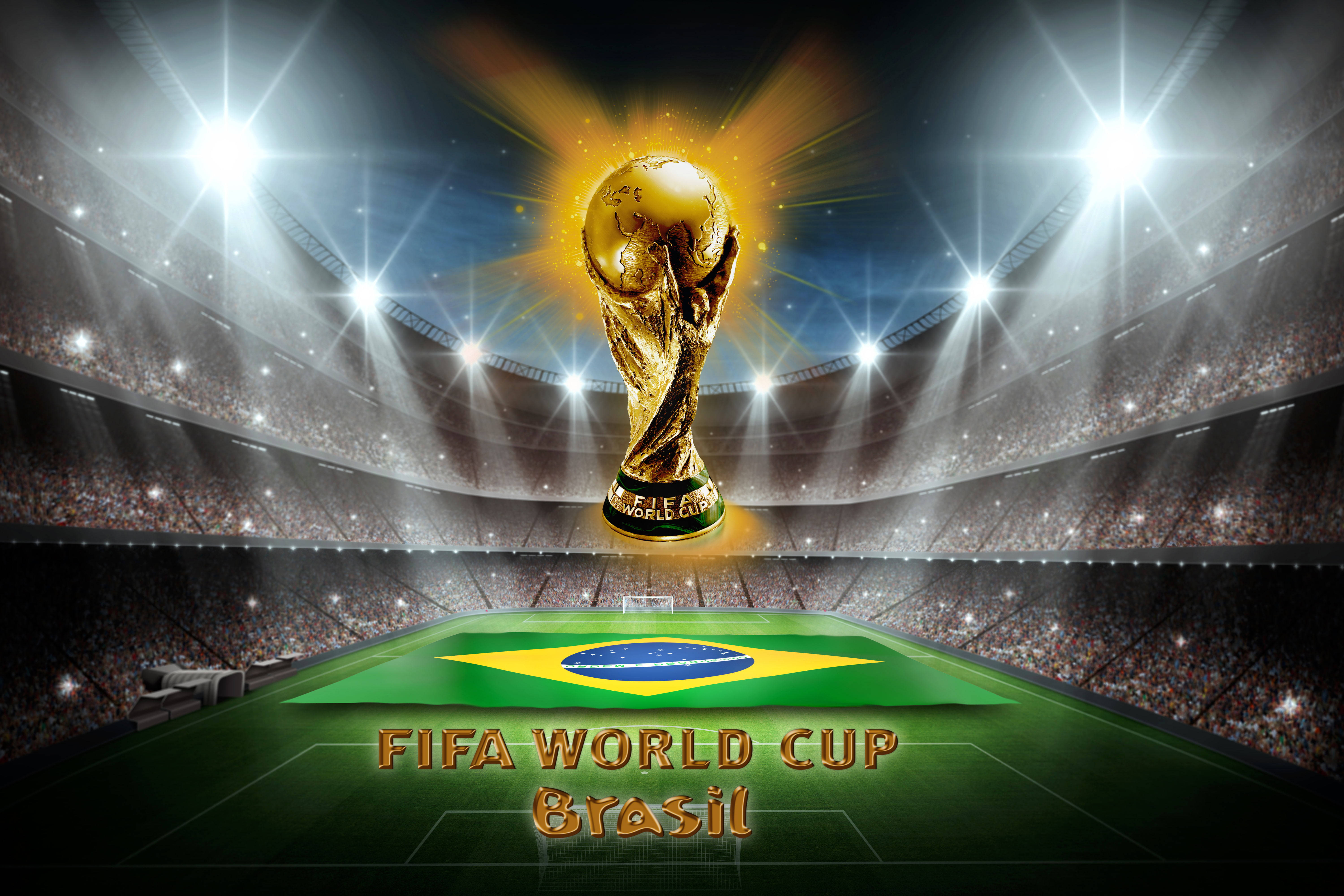 巴西國家足球隊國際足協世界盃獎盃 壁紙 — 金色FIFA世界盃獎盃在明亮的泛光燈下，在擠滿觀眾的球場中的巴西國旗場地上閃耀。