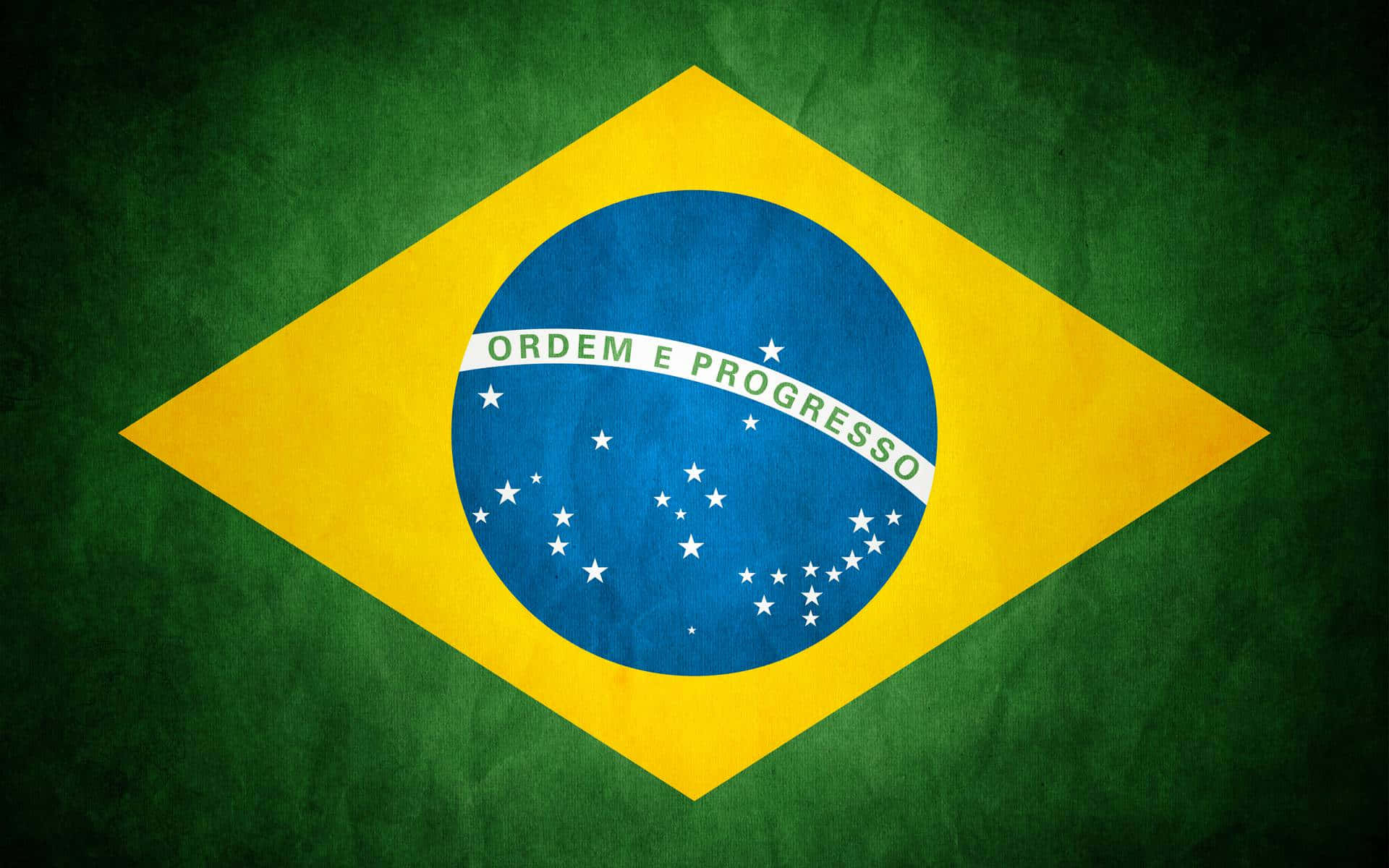 Brazil 桌布 壁紙 — 巴西國旗，帶有紋理綠色背景和黃色菱形，內有藍色地球儀，上有白色星星和格言。