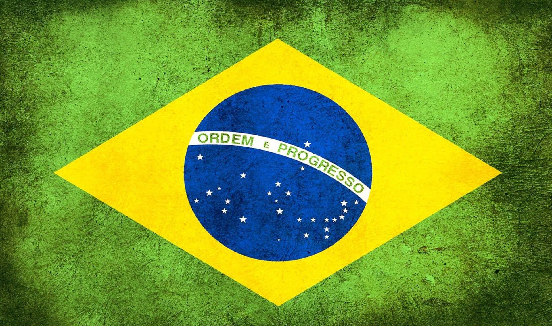 Brazil 桌布 壁紙 — 巴西國旗，帶有綠色、黃色、藍色星星和格言，背景為紋理復古風格。