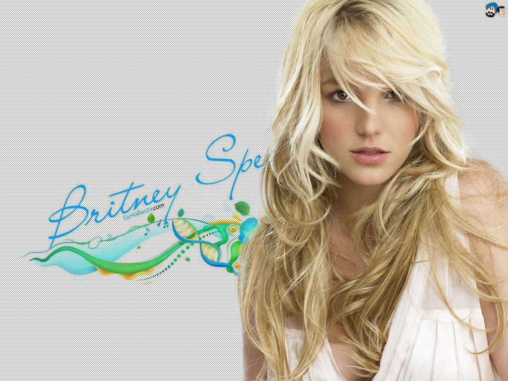 Britney Spears 身穿白色上衣，一頭飄逸的金髮，搭配色彩繽紛的抽象設計。