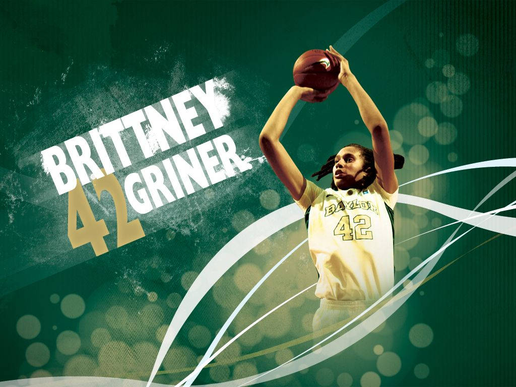 身穿黃色球衣42號的籃球運動員 Brittney Griner 正在投籃。