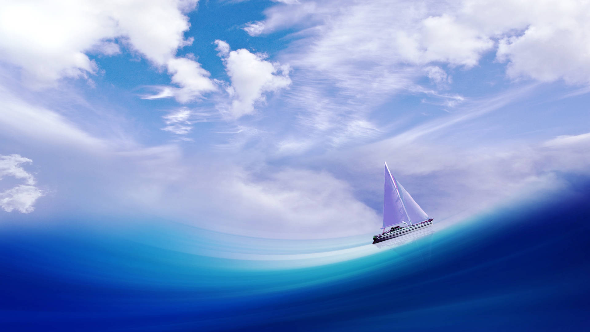 帆船在藍色海洋上航行，天空多雲