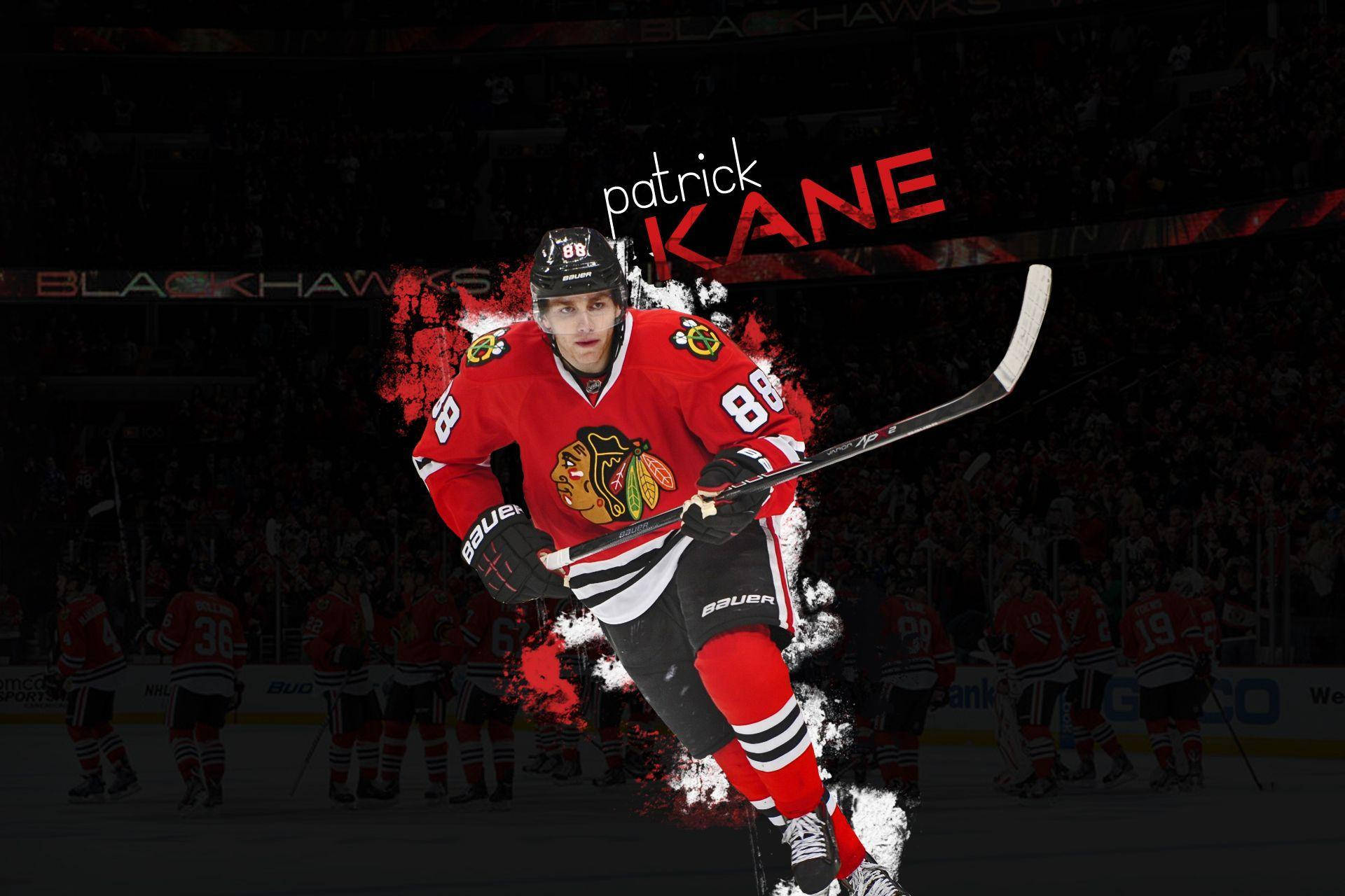 Patrick Kane 身穿 Blackhawks 制服在比賽中在冰上滑冰。
