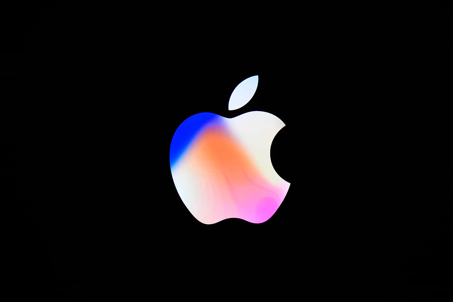 Apple標誌在黑色背景上帶有彩色漸變