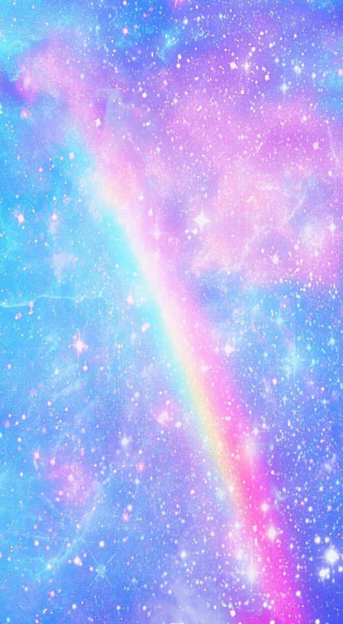 帶彩虹的可愛柔粉星系 壁紙 — 一個充滿活力的宇宙場景，彩虹流星劃過點綴著閃爍星星的粉紅、藍色和紫色粉彩星雲。
