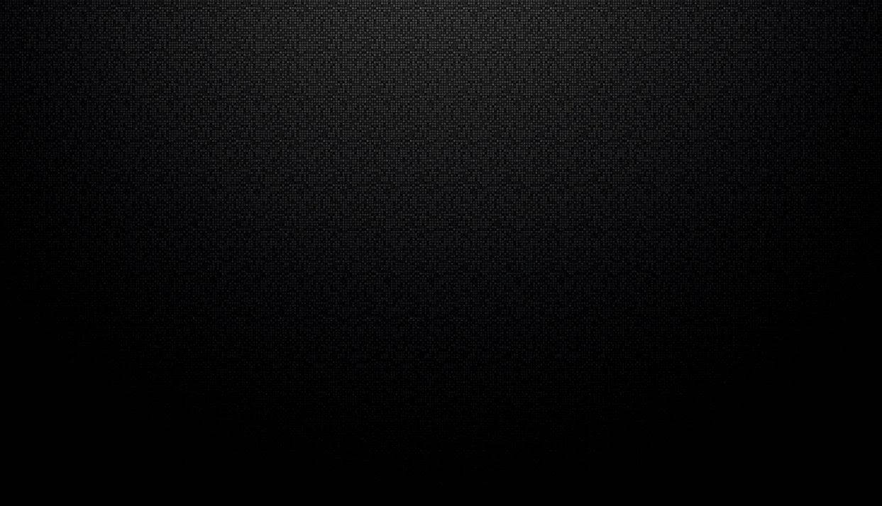 一個深色紋理背景，帶有從頂部中央而來的柔和漸變照明。