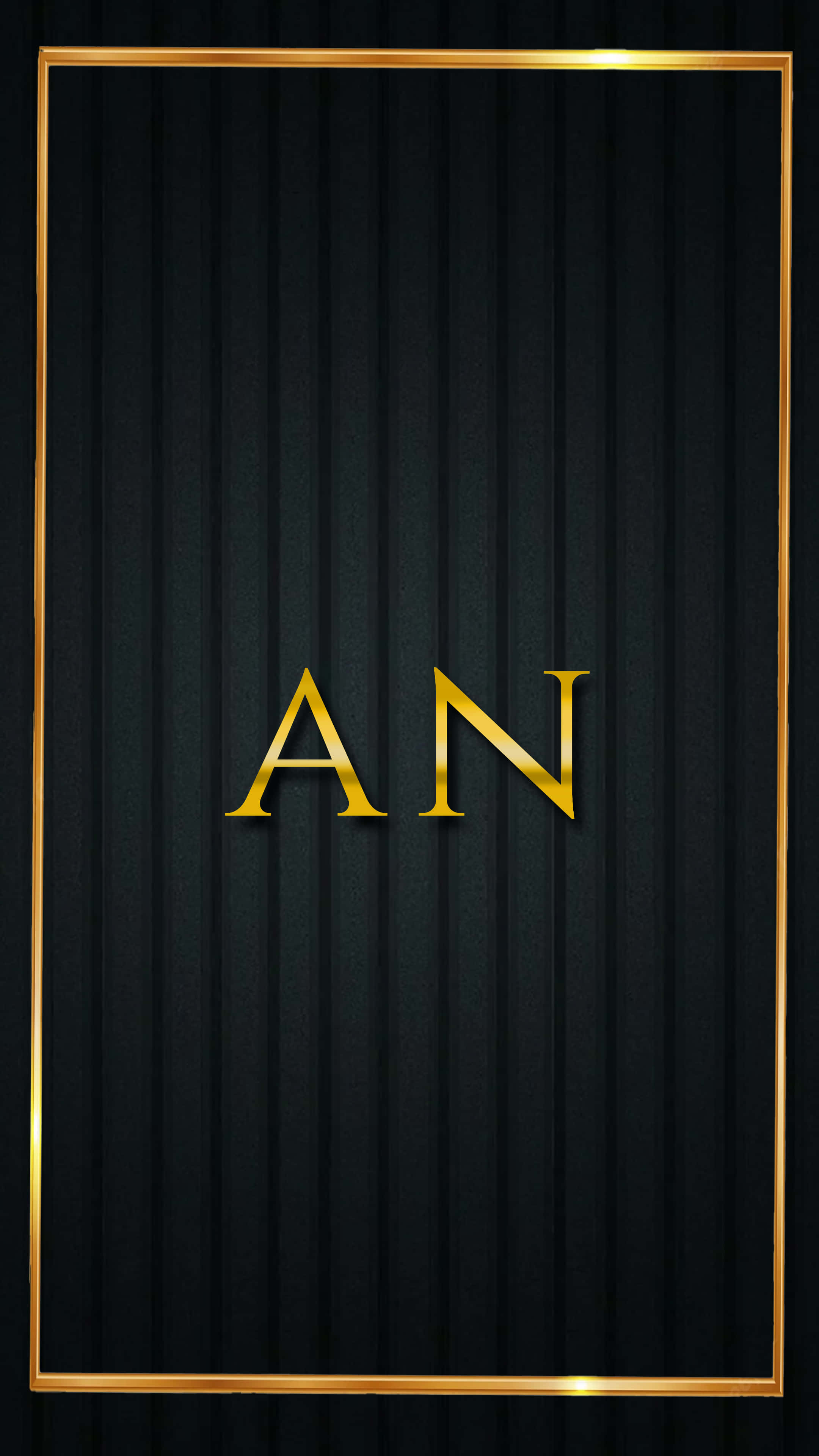 帶有金屬裝飾的「AN」字體 壁紙 — 金色字母 AN 在黑色紋理背景上閃耀，並由發光的金色邊框框起。