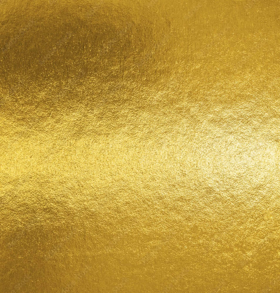 Foil 桌布 壁紙 — 帶有閃爍高光和細微色調變化的紋理金箔特寫。