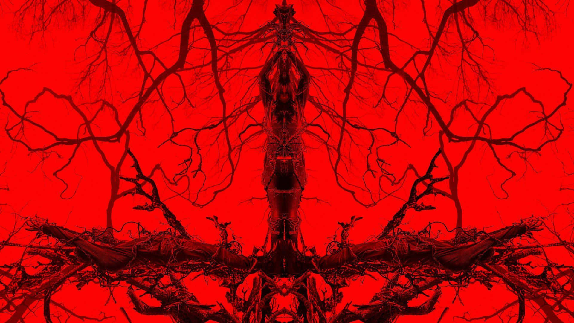 在鮮紅色背景上對稱的深色樹枝鏡像。