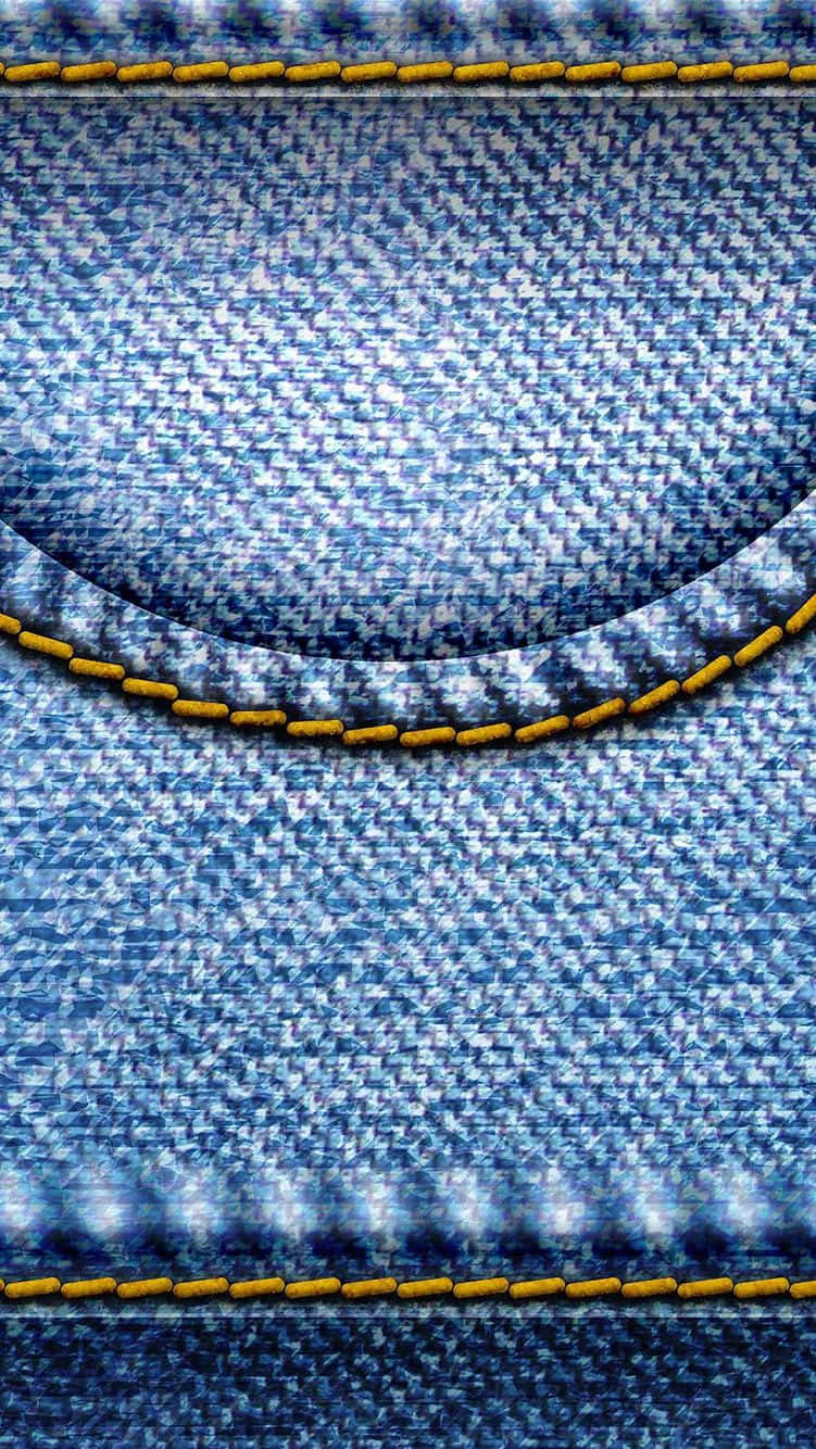 Denim 桌布 壁紙 — 帶有黃色縫線勾勒口袋的紋理藍色牛仔布料的特寫。