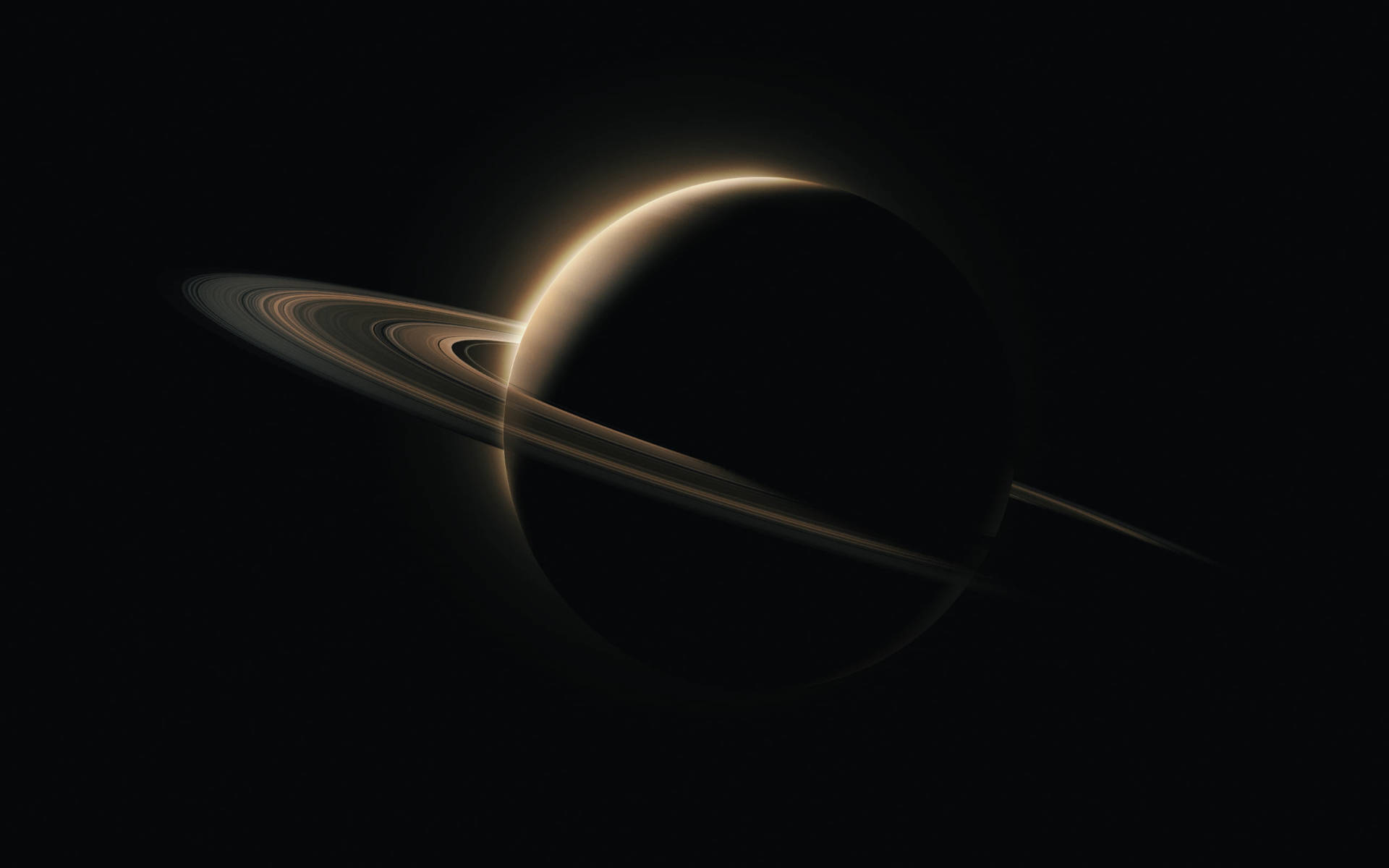 帶棕色環的黑色行星 壁紙 — 土星在日出時的壯麗景色，其標誌性光環在太空的黑色虛空中閃耀。