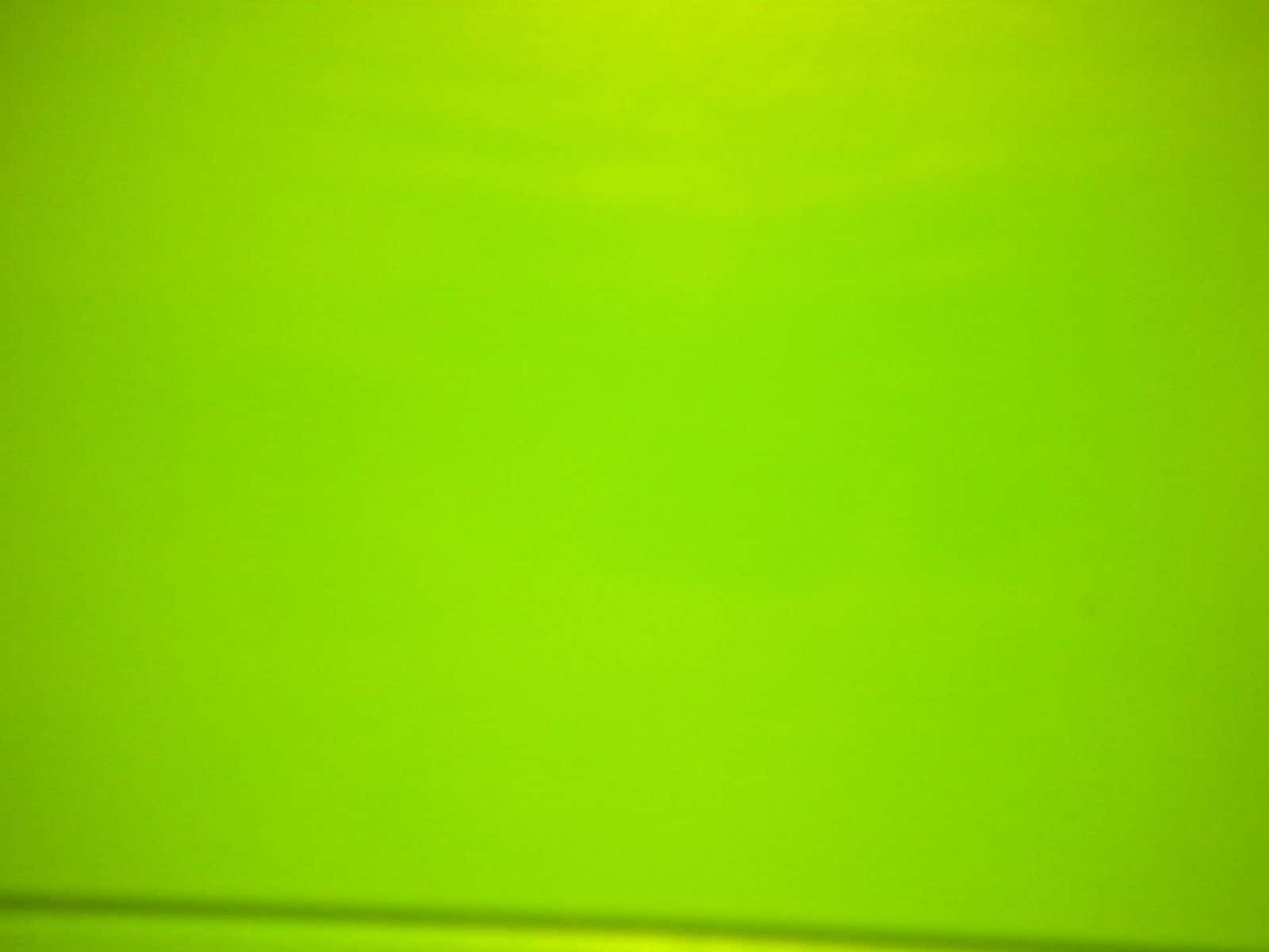 Lime Green 桌布 壁紙 — 平滑嘅鮮艷青檸綠色漸變，底部附近有微妙嘅水平陰影。