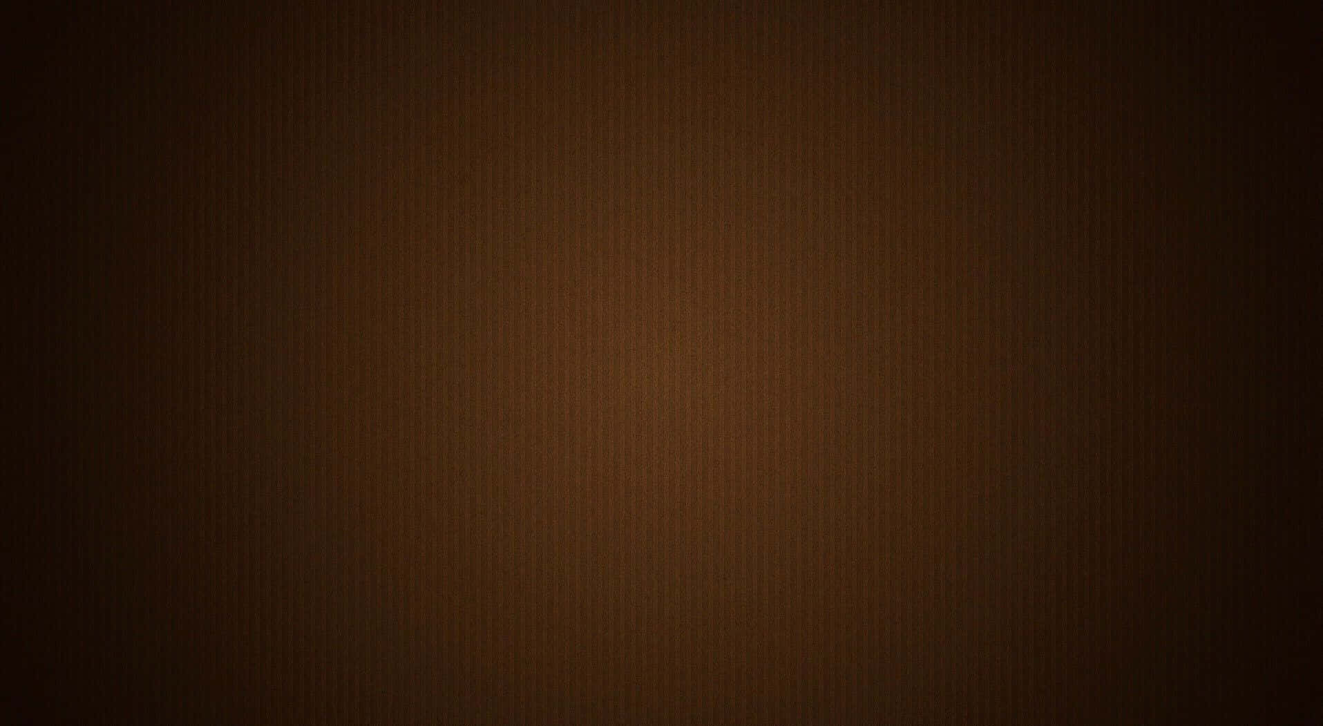 Dark Brown 桌布 壁紙 — 平滑的暖棕色漸變，帶有微妙的垂直紋理，從深色邊緣漸變到較淺的中心。
