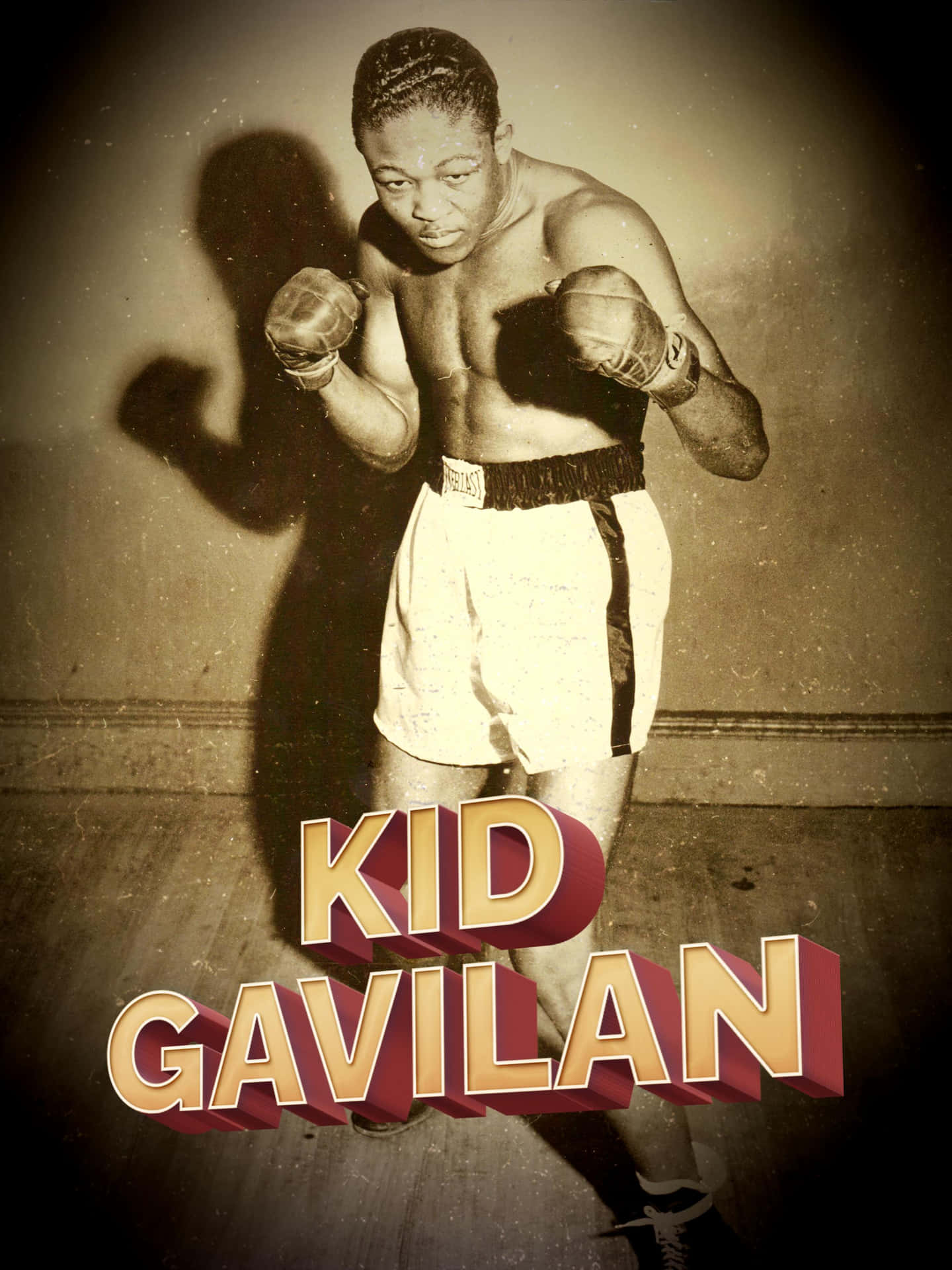 拳擊手Kid Gavilan擺出戰鬥姿勢的復古照片，帶有粗體文字疊加。