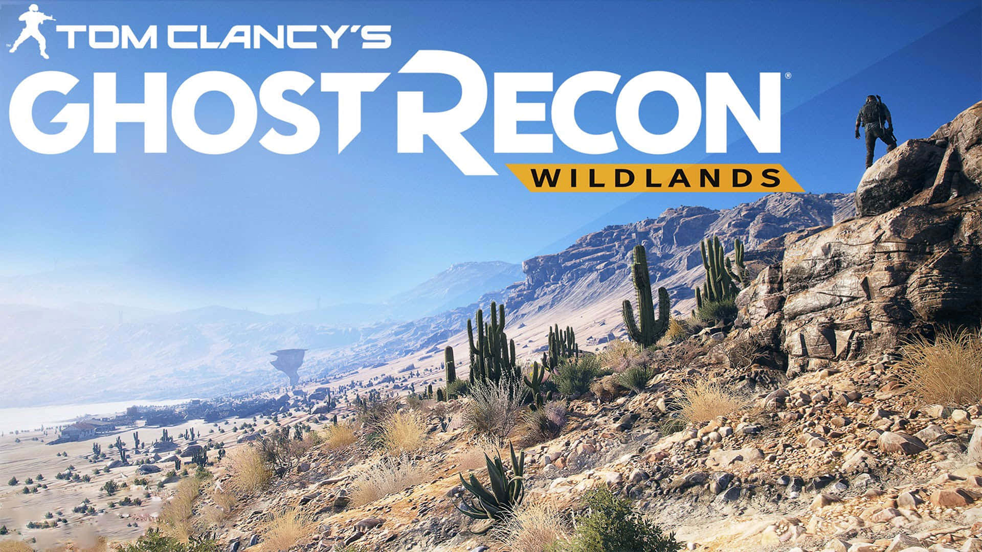 沙漠懸崖上的士兵俯瞰遊戲標題 Ghost Recon Wildlands