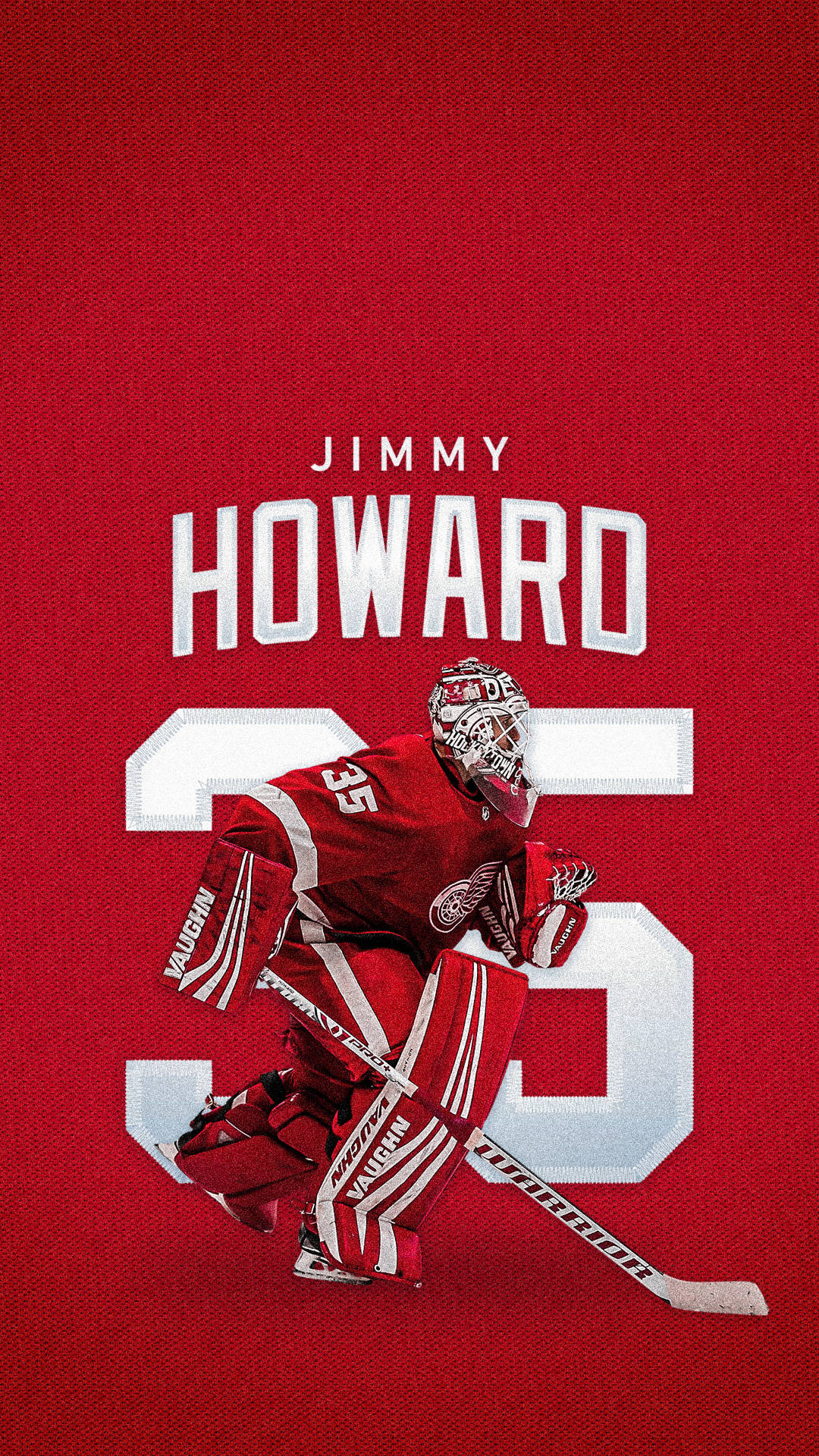 冰球守門員Jimmy Howard身穿紅色裝備，手持球棒蹲下。