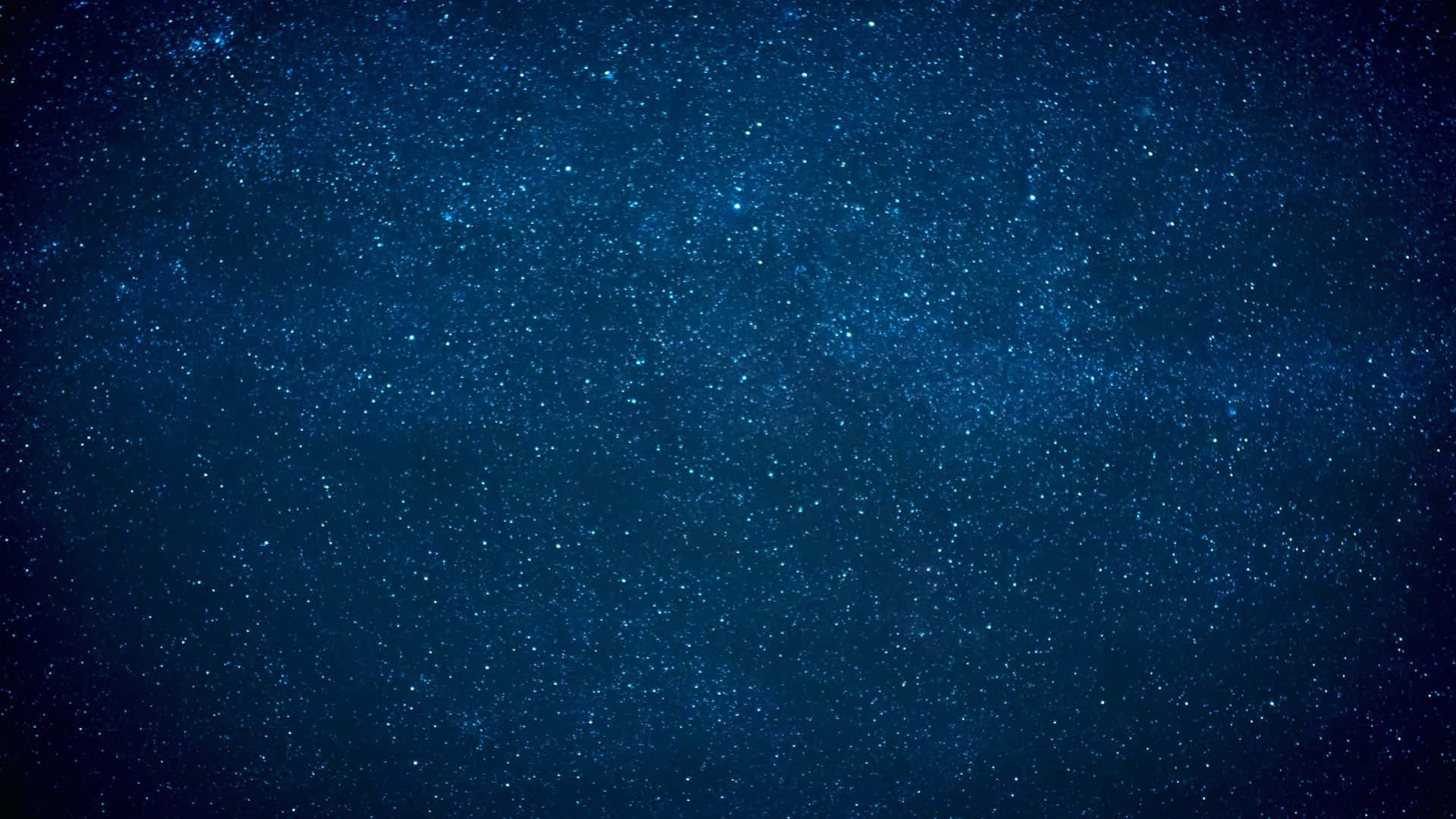 Dark Night 桌布 壁紙 — 廣闊深藍夜空，點綴無數閃爍星星，營造寧靜宇宙背景。